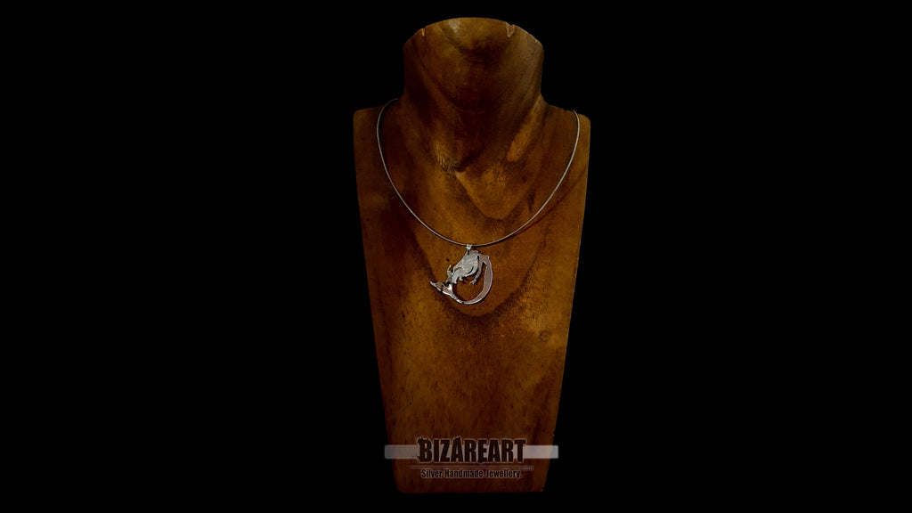 Mythological silver mermaid necklace worn to show pendant size