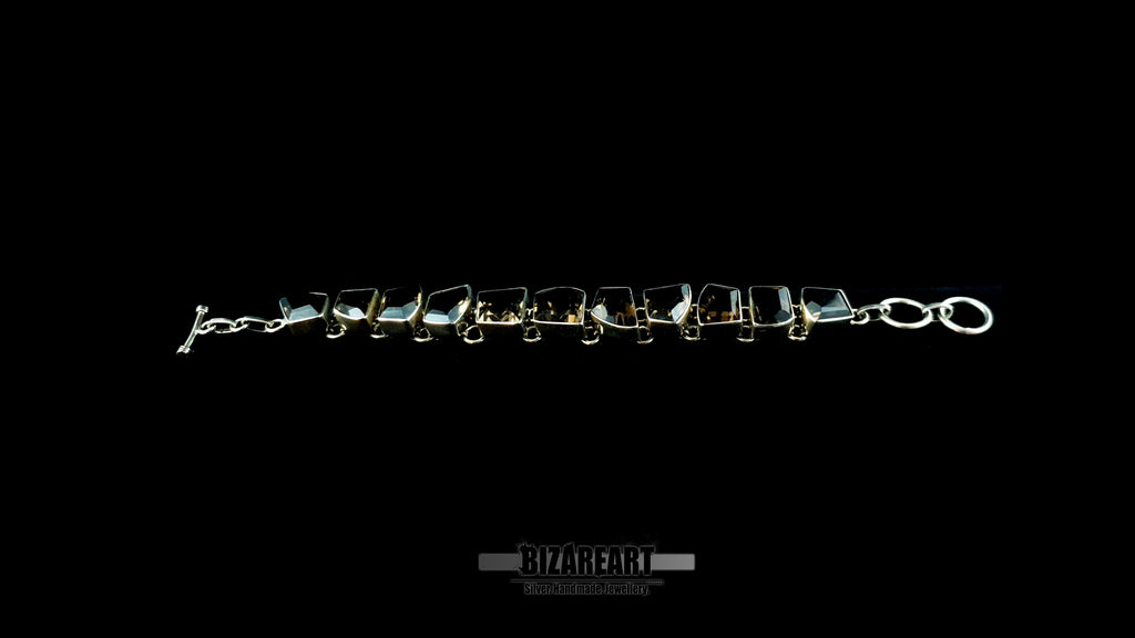 Full length 19.5cm sterling silver smoky quartz bracelet.
