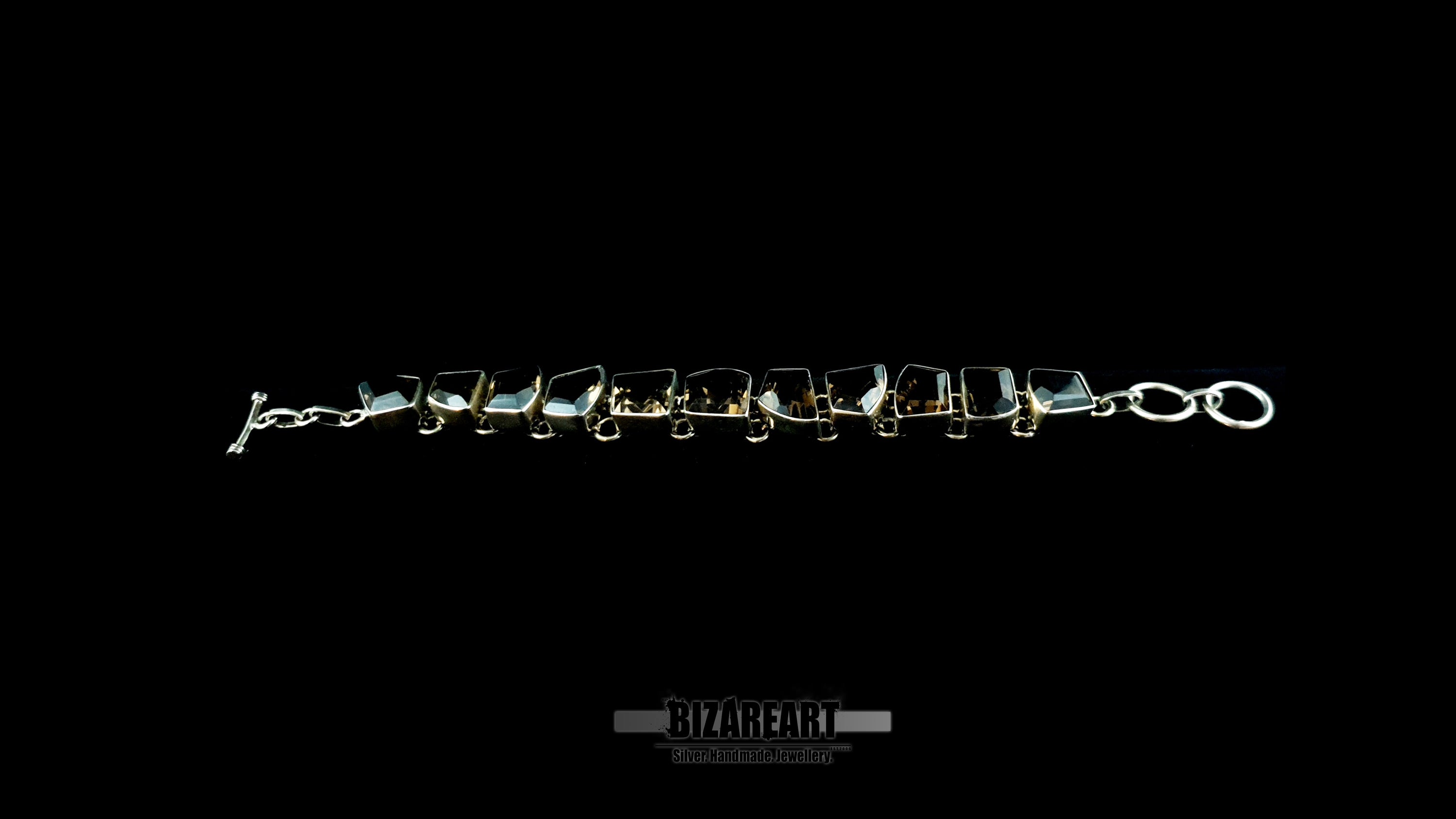 Full length 19.5cm sterling silver smoky quartz bracelet.