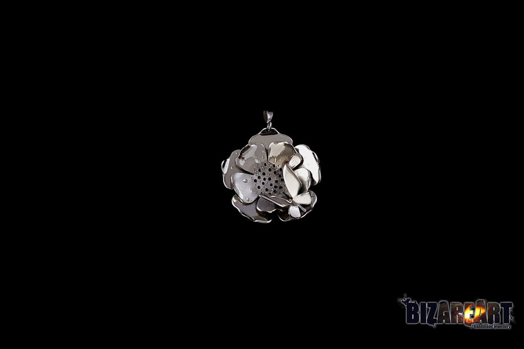 Handmade .925 sterling silver lotus flower pendant necklace with high-shine rhodium finish.