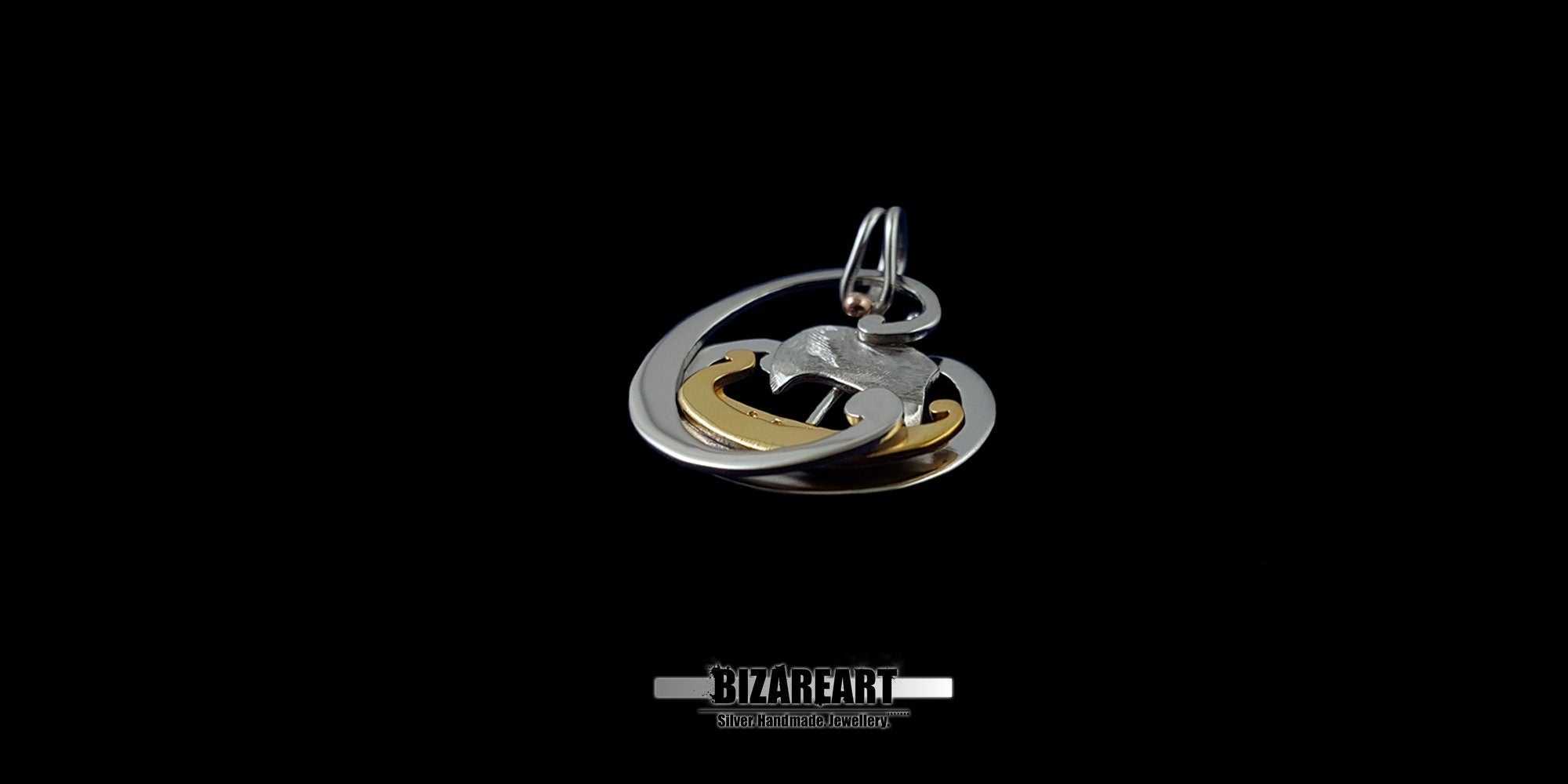 Direct view of the pendant's multi-tonal finish, showcasing the contrast between the polished silver and the textured gold elements.