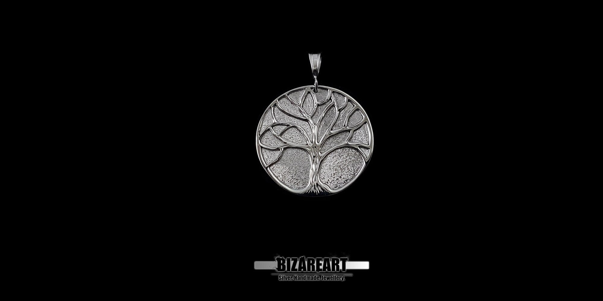 Black background of the Artisan silver tree necklace to show scale and the dark vintage finish