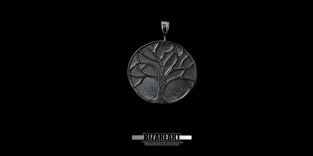 Oxidized sterling silver Tree of Life pendant with high-contrast carved details