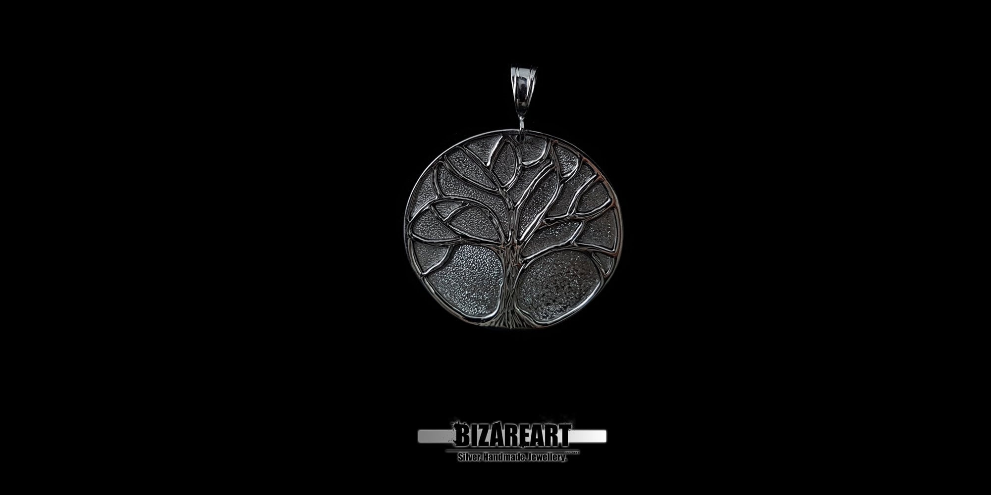 Oxidized sterling silver Tree of Life pendant with high-contrast carved details