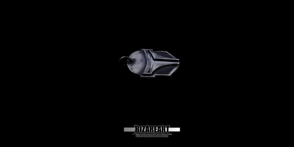 Side profile view of the solid 925 silver Boba Fett helmet charm, highlighting the multi-layered design and textured details.