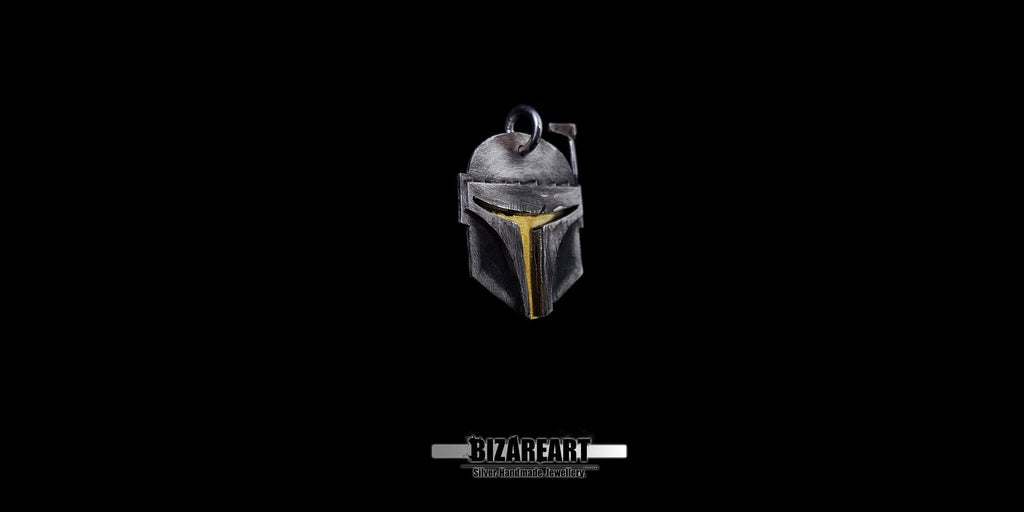 Handmade sterling silver Boba Fett helmet pendant with a detailed yellow visor against a black background.