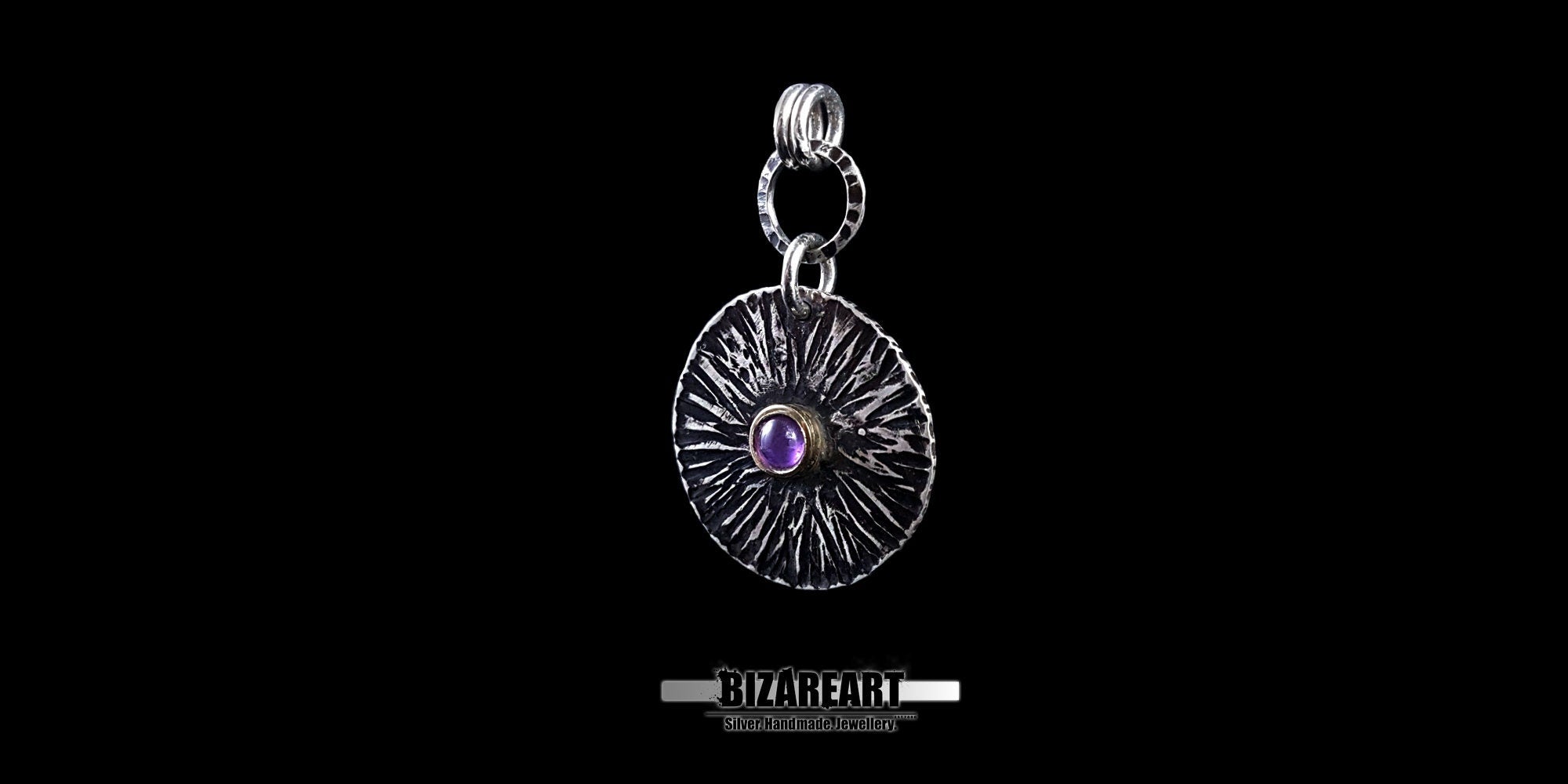 Angled side profile of the Bromo pendant highlighting the outward bend deformation and the hammered silver ring connector.