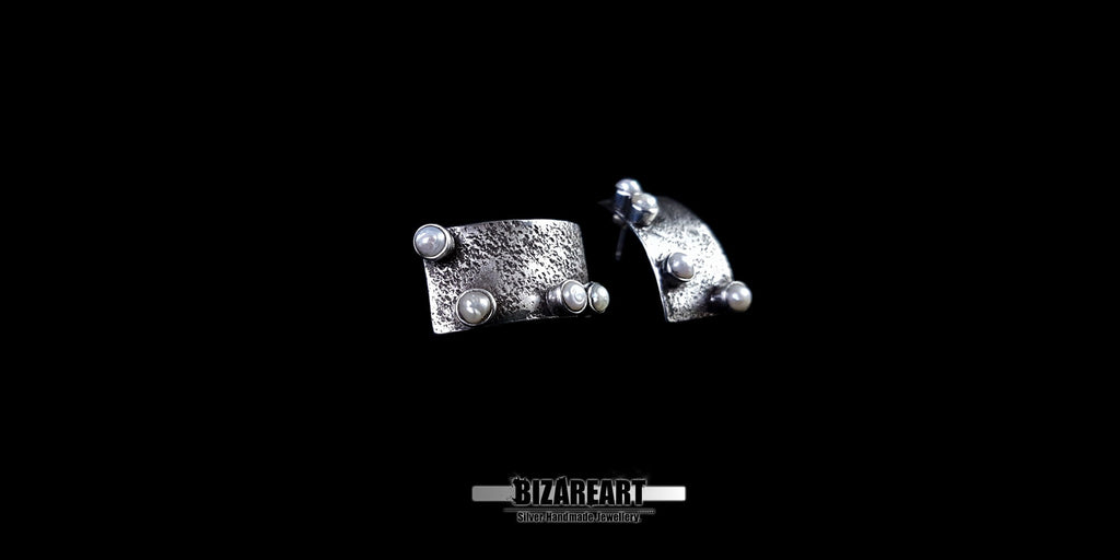 Angled shot of the rectangle pearl studs showcasing the vintage oxidized silver and elegant pearl arrangement.