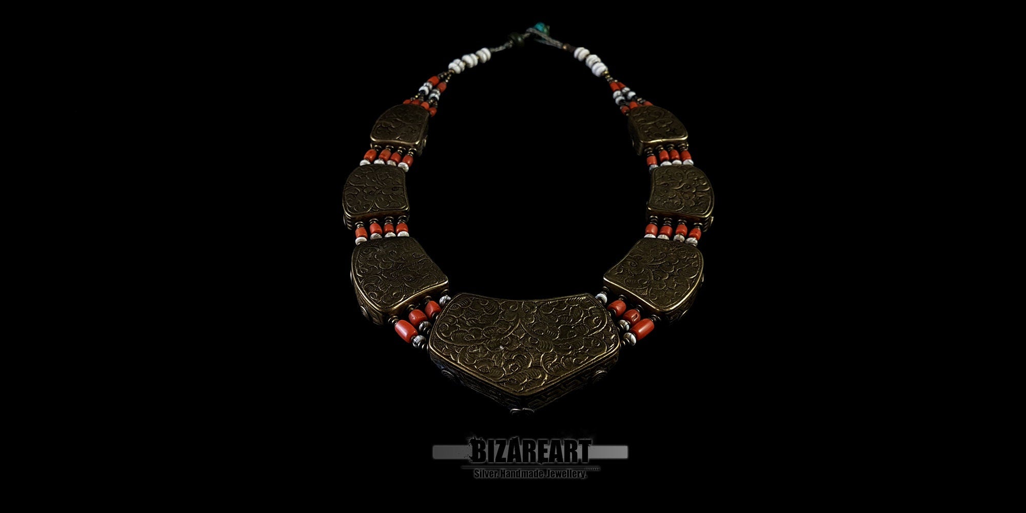 Back view of the vintage Nepalese collar necklace, showing the solid, intricately detailed bronze metalwork side of the reversible design.