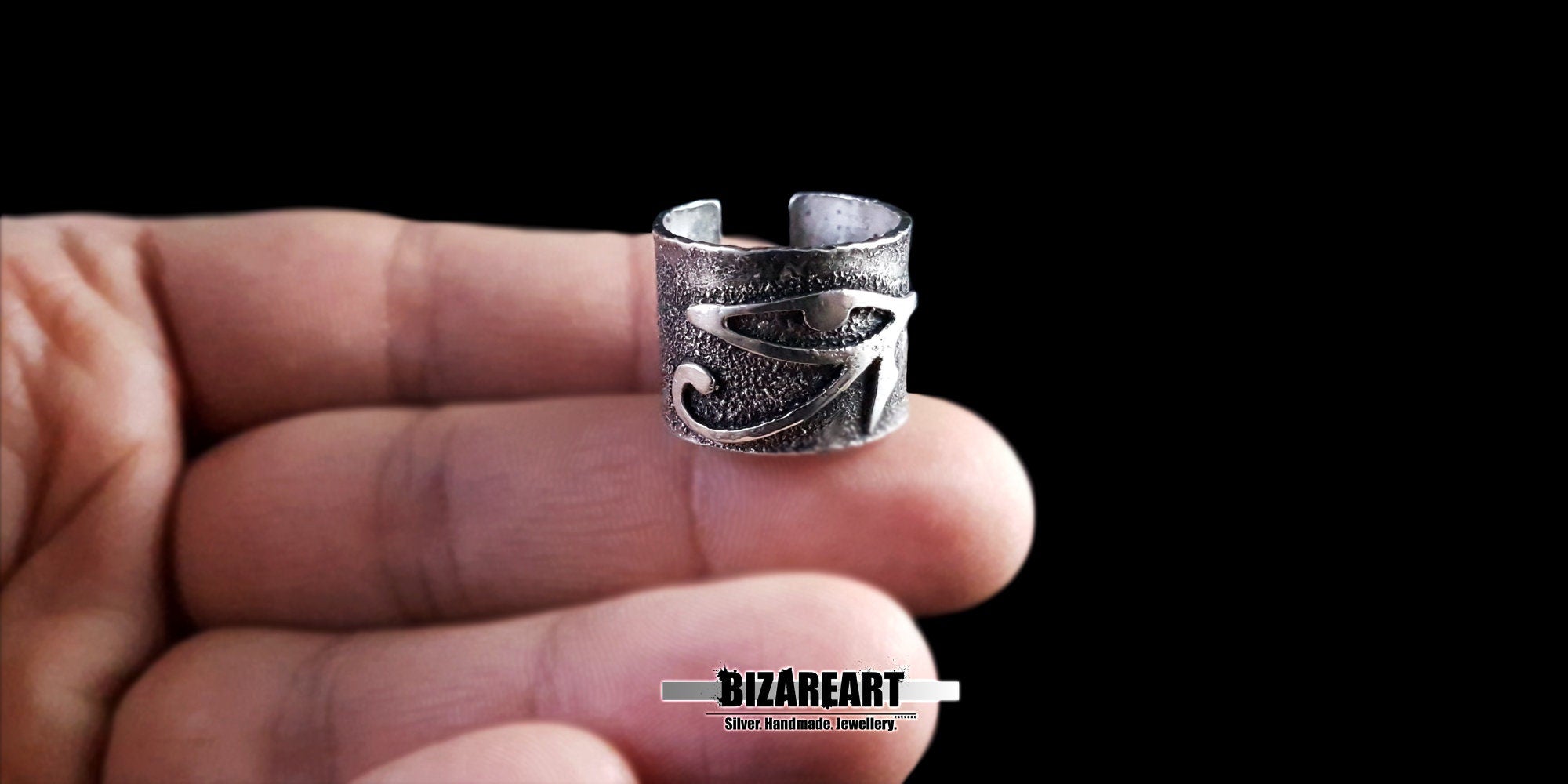 Eye of Ra Egyptian ring worn on a hand to show scale and texture