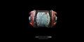 Front close-up of a handmade Tibetan-style silver cuff bracelet featuring a large, rectangular matrix turquoise stone. The centerpiece is flanked by two panels of inlaid red coral mosaic and smaller turquoise details.