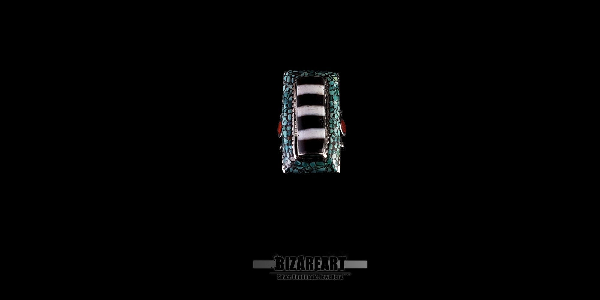 Direct overhead top-down view of the large rectangular Tibetan striped agate gemstone and silver bezel pattern on the vintage ring.