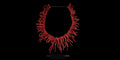 Natural Mediterranean red coral branch necklace laid flat against a black background - Bizareart luxury jewelry