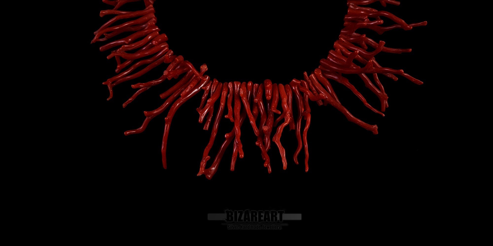 Close-up detail of the vibrant, unblemished red coral branches showing the natural texture and premium quality of the handmade necklace.

Third Image (On the mannequin stand)