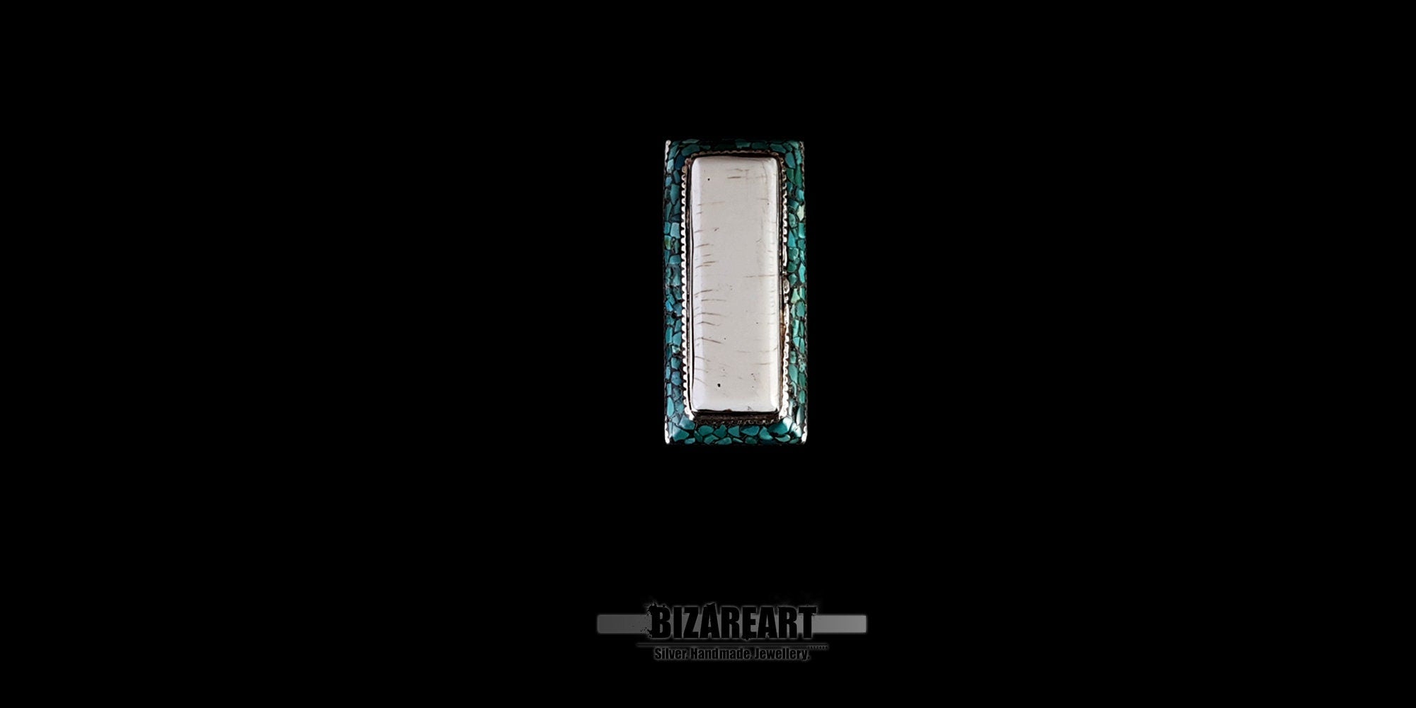 Direct top-down view of a rectangular Himalayan silver statement ring showing the long white conch shell center bordered by vibrant turquoise inlay stones.