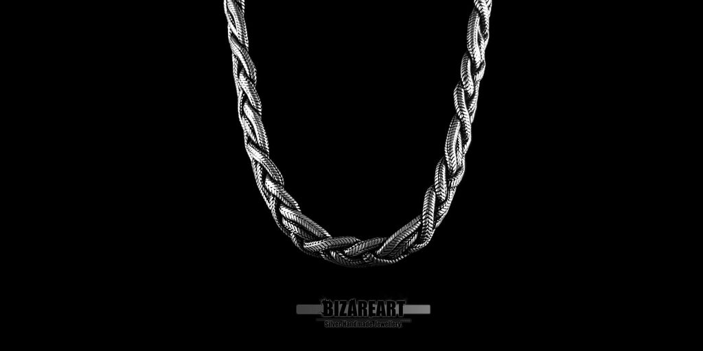Overhead flat lay of the circular silver rope chain, demonstrating its uniform shape and 43.5 cm length.