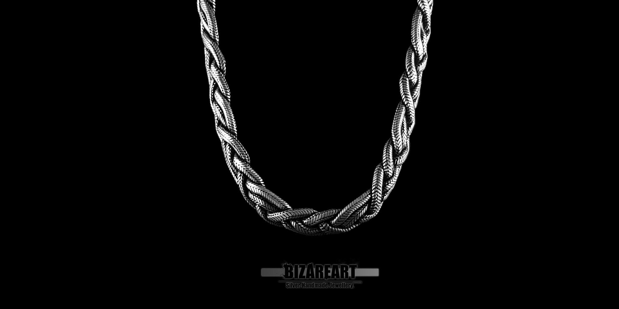 Overhead flat lay of the circular silver rope chain, demonstrating its uniform shape and 43.5 cm length.