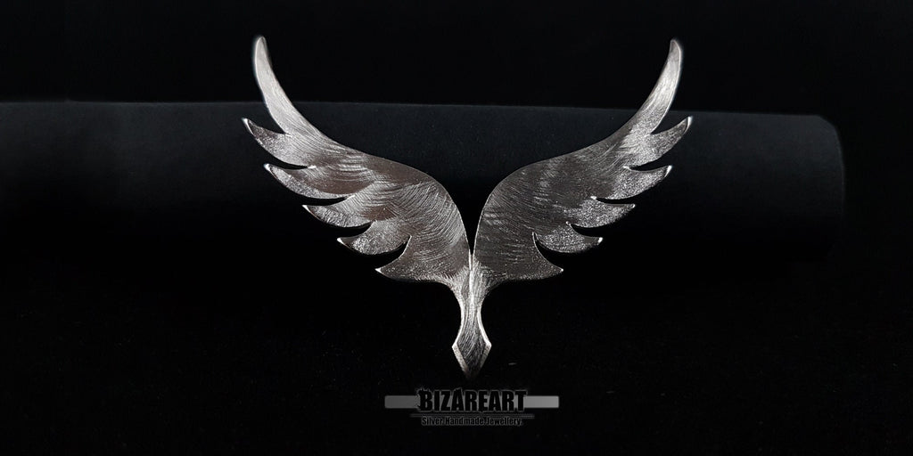 The Angel Wings v5.0 pendant displayed on a dark jewelry mount to show the scale and 5cm height of the piece.