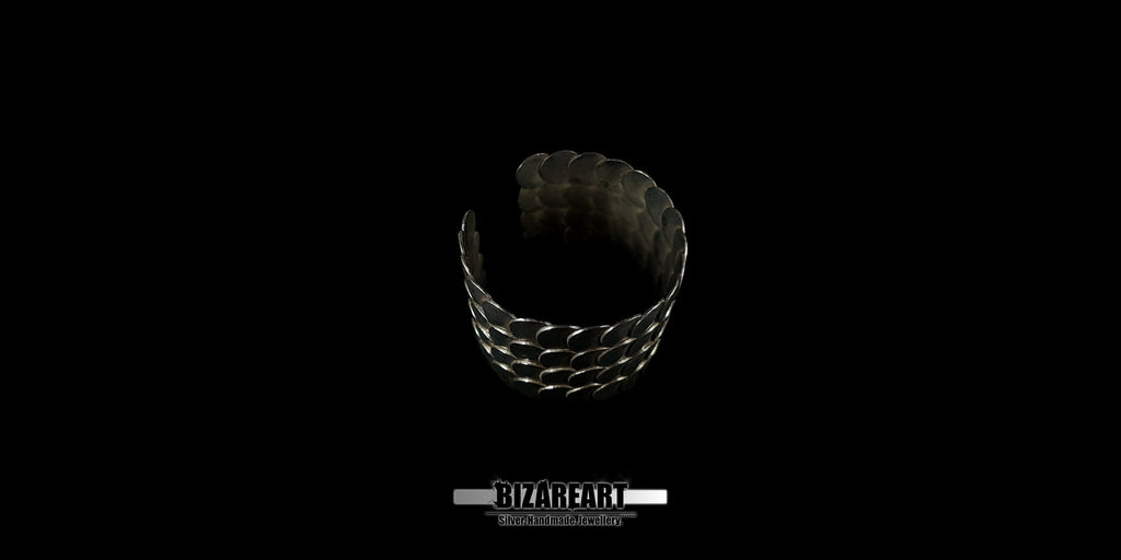 A top-down perspective of the open cuff, emphasizing the flexible gap for easy wrist adjustment.