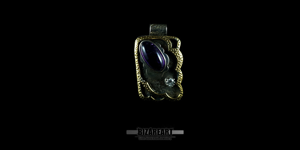 The smooth, high-quality silver of the 4.3 cm tall Bizareart pendant, showing the hallmark of authentic handmade Greek craftsmanship.