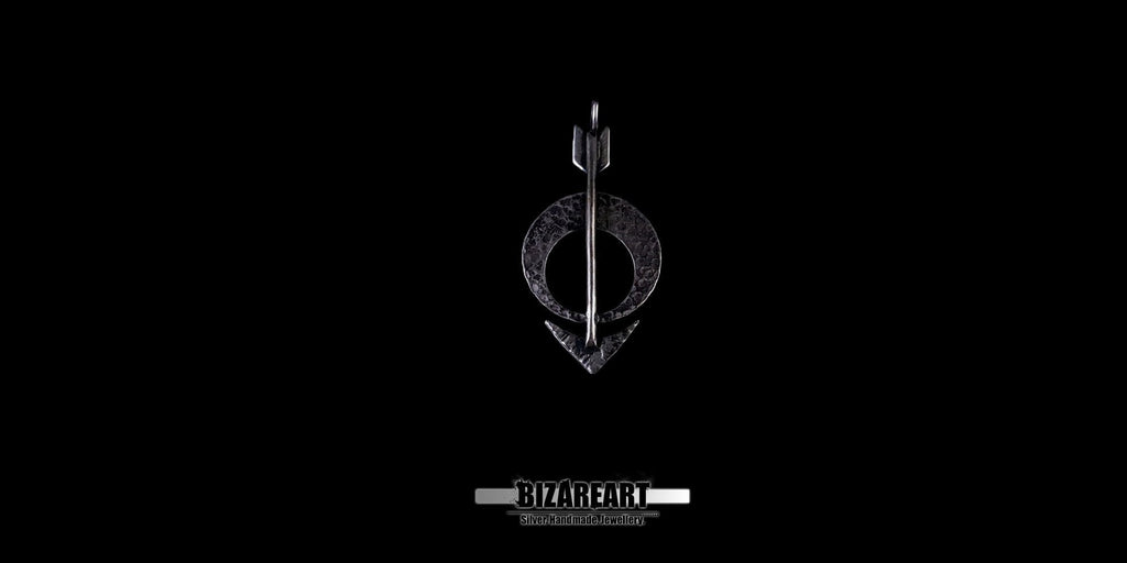 Distant view of the silver moon arrow charm, highlighting its sleek, lightweight silhouette.