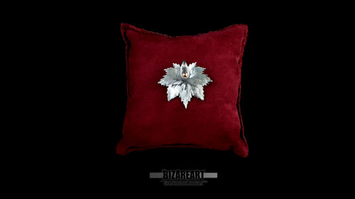 Handcrafted 925 sterling silver maple leaf pendant with mixed-metal rose gold center, displayed on a luxury red velvet cushion.