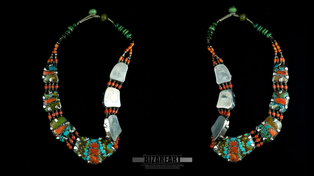 Front and back view of silver statement collar showing solid hand burnished backings