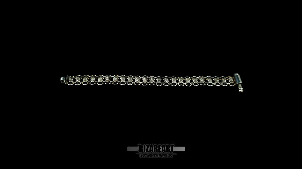 Full length flat lay angle view of the of the 31.7g Bizareart silver link bracelet, showcasing the smooth, polished inner surface construction.