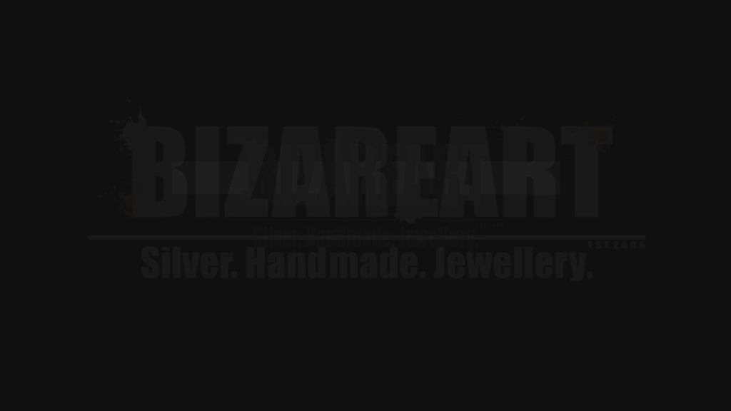 Studio product showcase video revealing the multi-angle iridescence, fluid hoop links, and secure toggle clasp of the handmade silver baroque pearl bracelet.