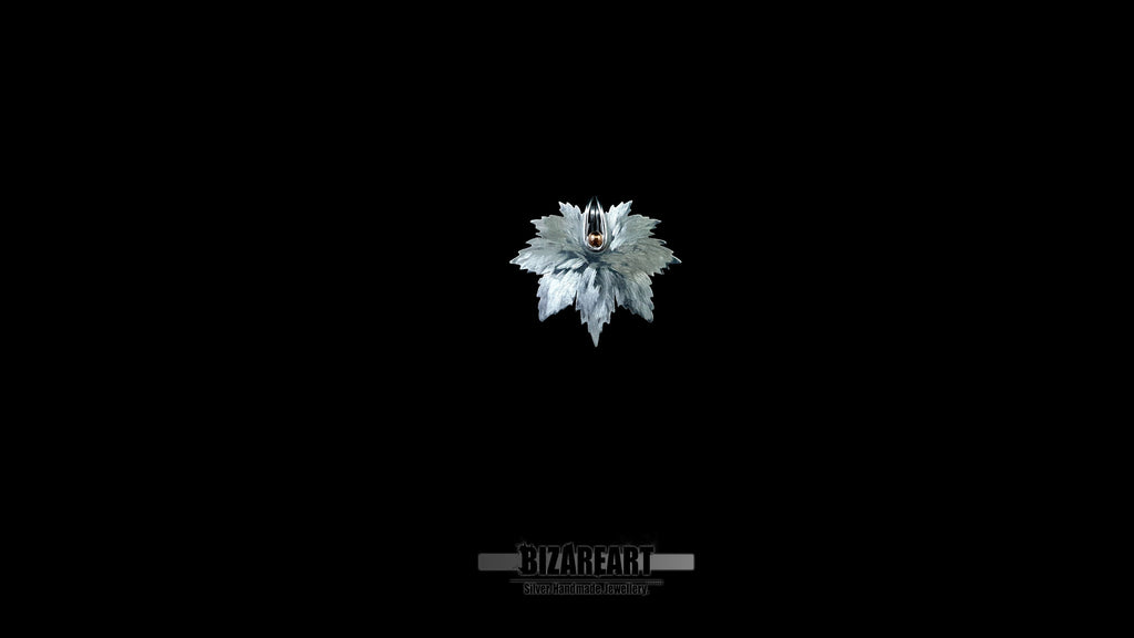 360-degree rotating video of the Maple Leaf pendant, showcasing how the light catches the textured silver surface and the secure, integrated bail design.