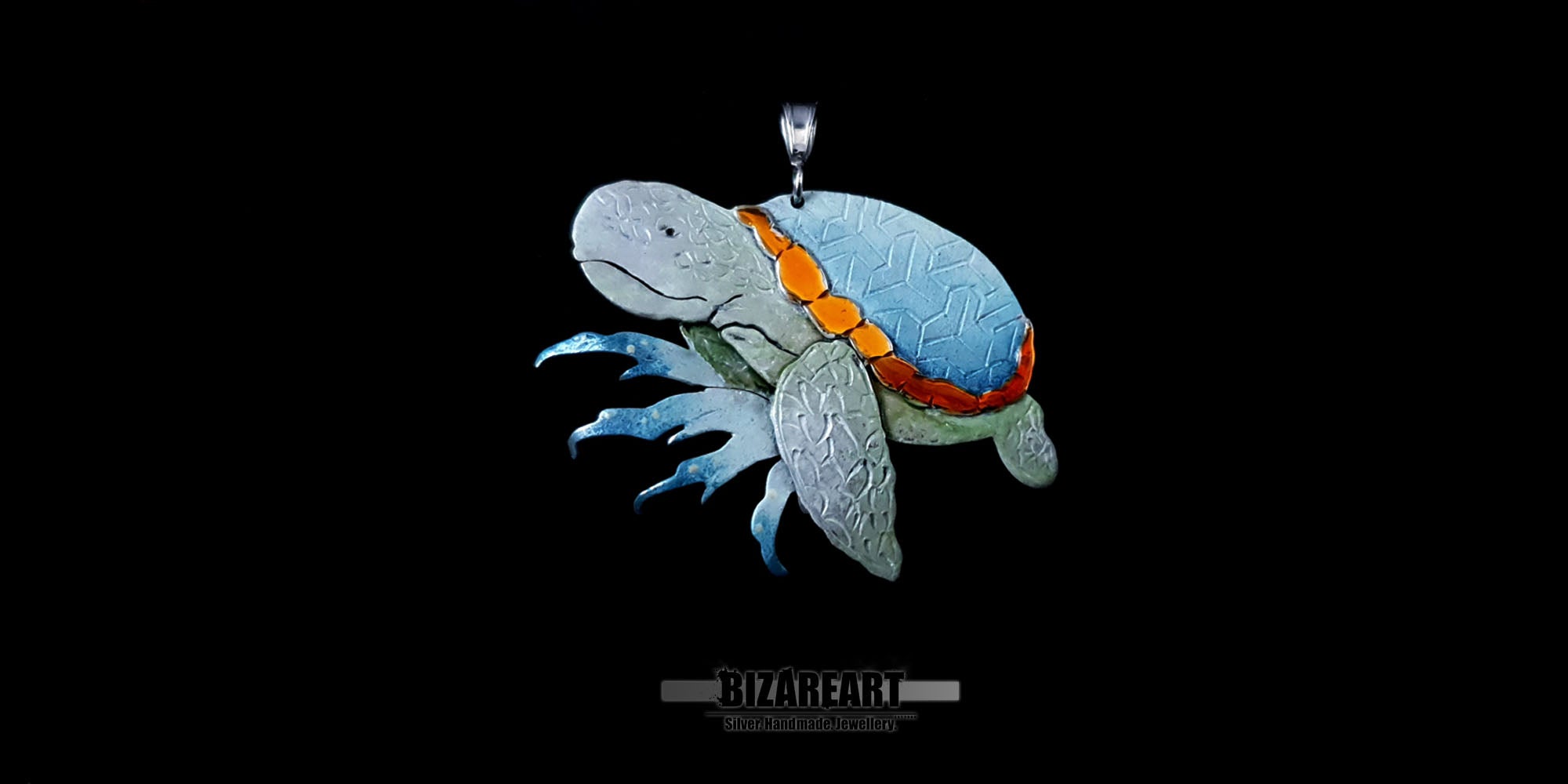 A video showcasing the light reflecting off the hand-applied liquid enamel and the textured silver details of the sea turtle pendant.