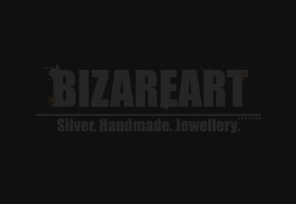 Video close-up and panning shots of the vintage Nepalese necklace, scaling in on the gemstone details and turning over to reveal the fully finished, double-sided bronze reverse.